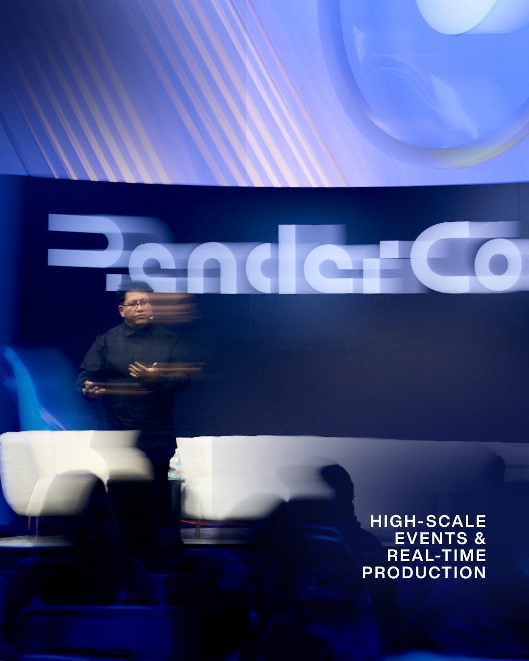High-scale tech event production photography at RenderCon Los Angeles, capturing dynamic stage lighting and corporate crowd energy.