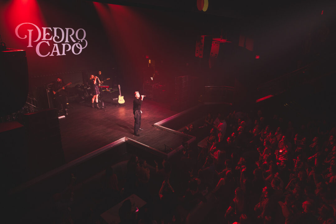 Live entertainment photography of Pedro Capo performing at a private Mastercard event in Miami Beach with 360-degree stage perspectives.