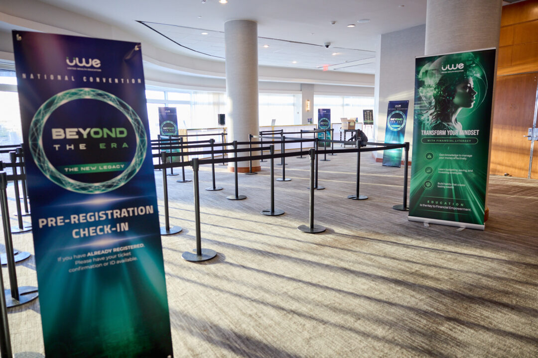 Event photography of speakers and networking at the UWE National Convention in Atlanta Georgia featuring high-energy corporate branding.