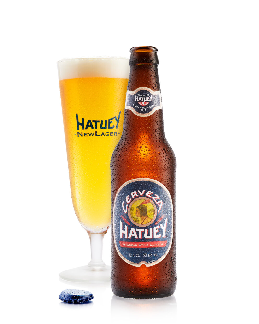 High-end beverage photography of Hatuey Beer for Bacardi branding and e-commerce featuring professional styling and condensation details.