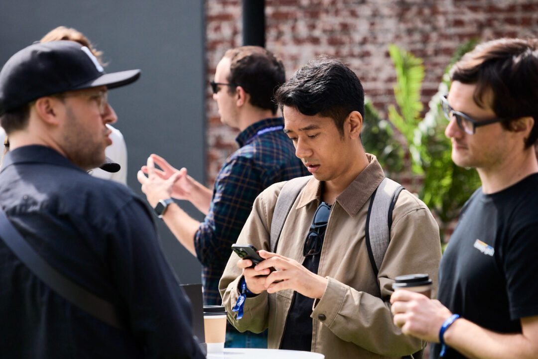 Comprehensive event photography coverage for RenderCon in Los Angeles, capturing keynote speakers, creative workshops, and high-level networking by commercial photographer Luis Cano. Candid networking and creative industry interaction at RenderCon LA, captured by commercial photographer Luis Cano for TAMZ Agency.
