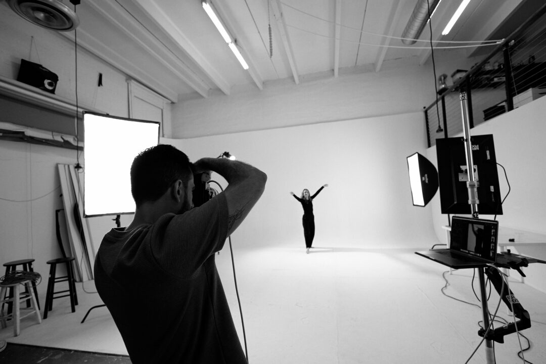 uis Cano leading a commercial advertising photoshoot with high-end lighting and professional art direction in Miami.