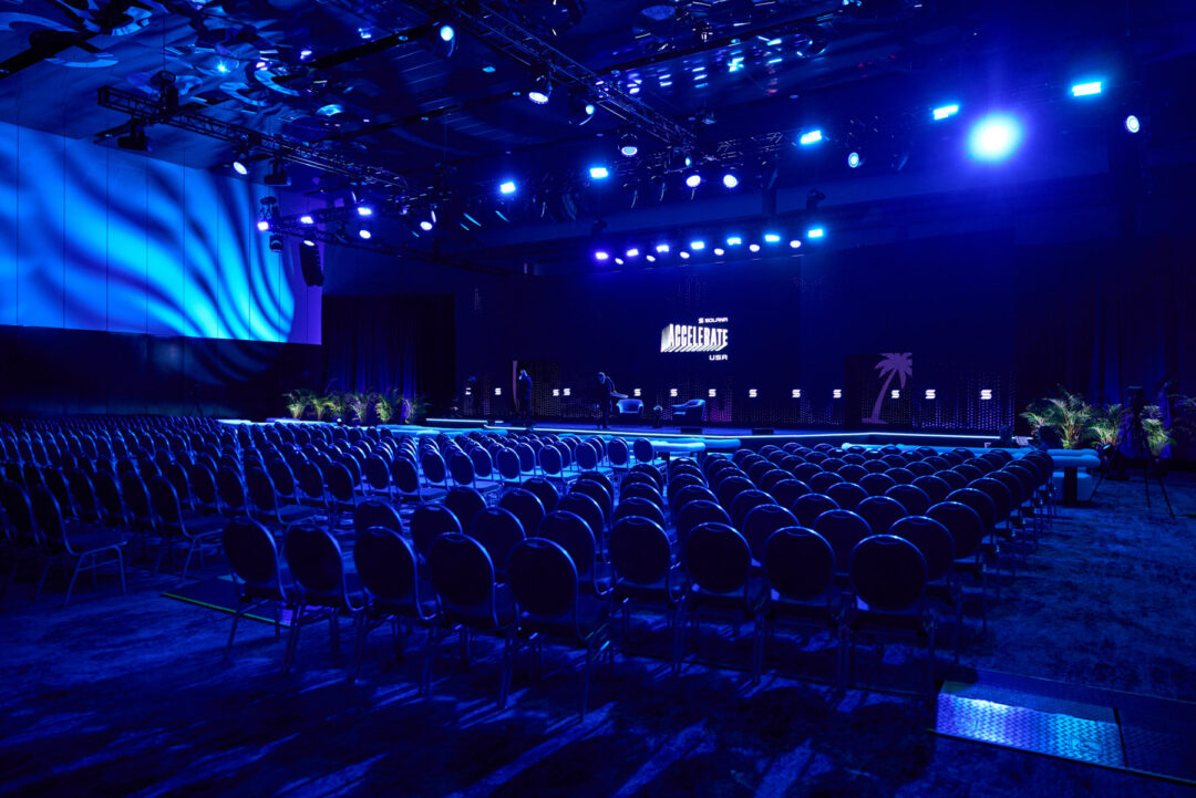 Comprehensive multi-day event photography for Solana Miami. High-speed digital tech workflow and real-time delivery by a professional team led by Luis Cano. Solana Miami branding and visual identity photography with vibrant blue lighting by Luis Cano.