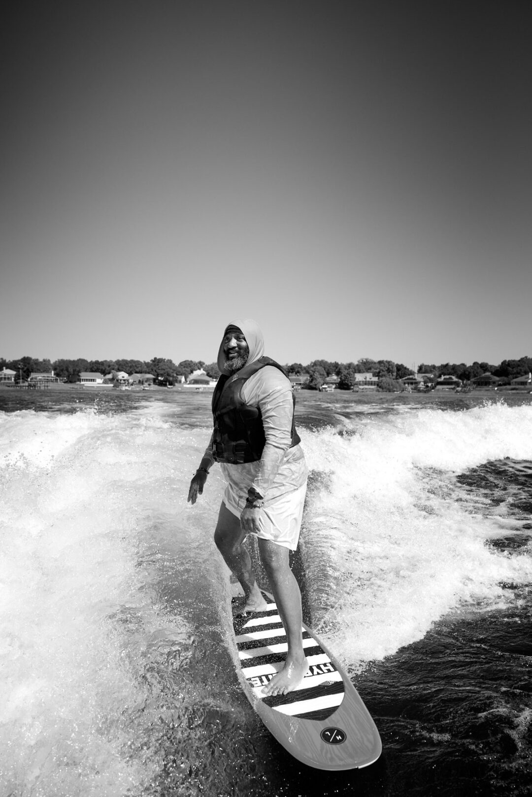 Action and documentary visual production for the Wake for Warriors (W4W) foundation. Capturing wounded veterans and their families experiencing therapeutic water sports, wakeboarding, and wake surfing as pathways to emotional and physical healing. Shot by Luis Cano. High-speed action sports photography of wounded veterans wake surfing at a Wake for Warriors therapeutic event, shot by Luis Cano.