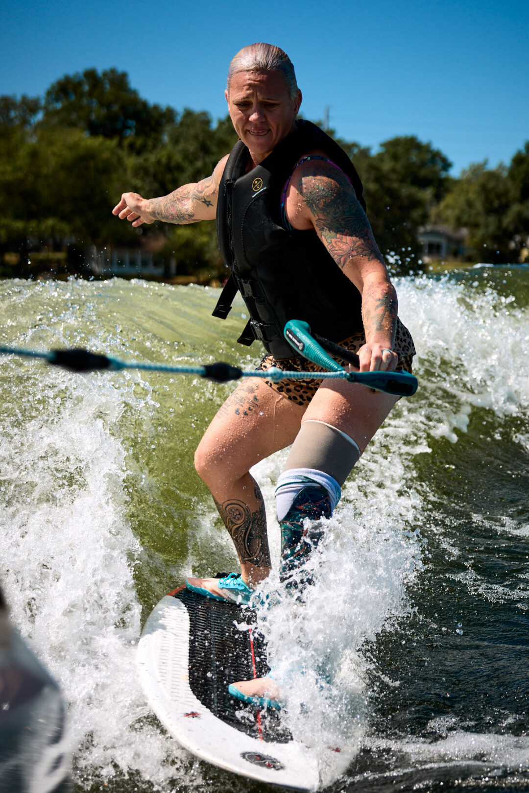 Action and documentary visual production for the Wake for Warriors (W4W) foundation. Capturing wounded veterans and their families experiencing therapeutic water sports, wakeboarding, and wake surfing as pathways to emotional and physical healing. Shot by Luis Cano. High-speed action sports photography of wounded veterans wake surfing at a Wake for Warriors therapeutic event, shot by Luis Cano.