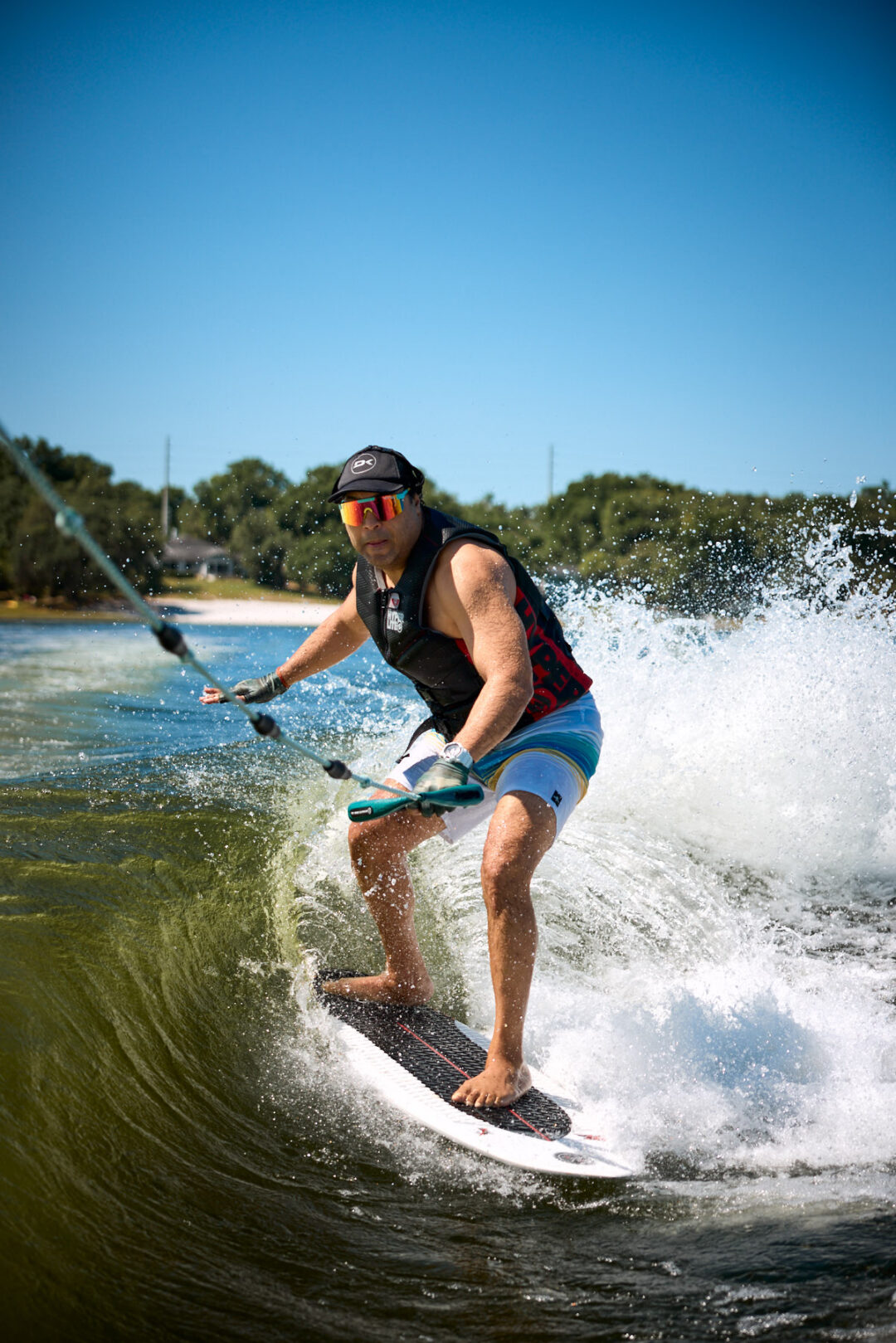 Action and documentary visual production for the Wake for Warriors (W4W) foundation. Capturing wounded veterans and their families experiencing therapeutic water sports, wakeboarding, and wake surfing as pathways to emotional and physical healing. Shot by Luis Cano. High-speed action sports photography of wounded veterans wake surfing at a Wake for Warriors therapeutic event, shot by Luis Cano.