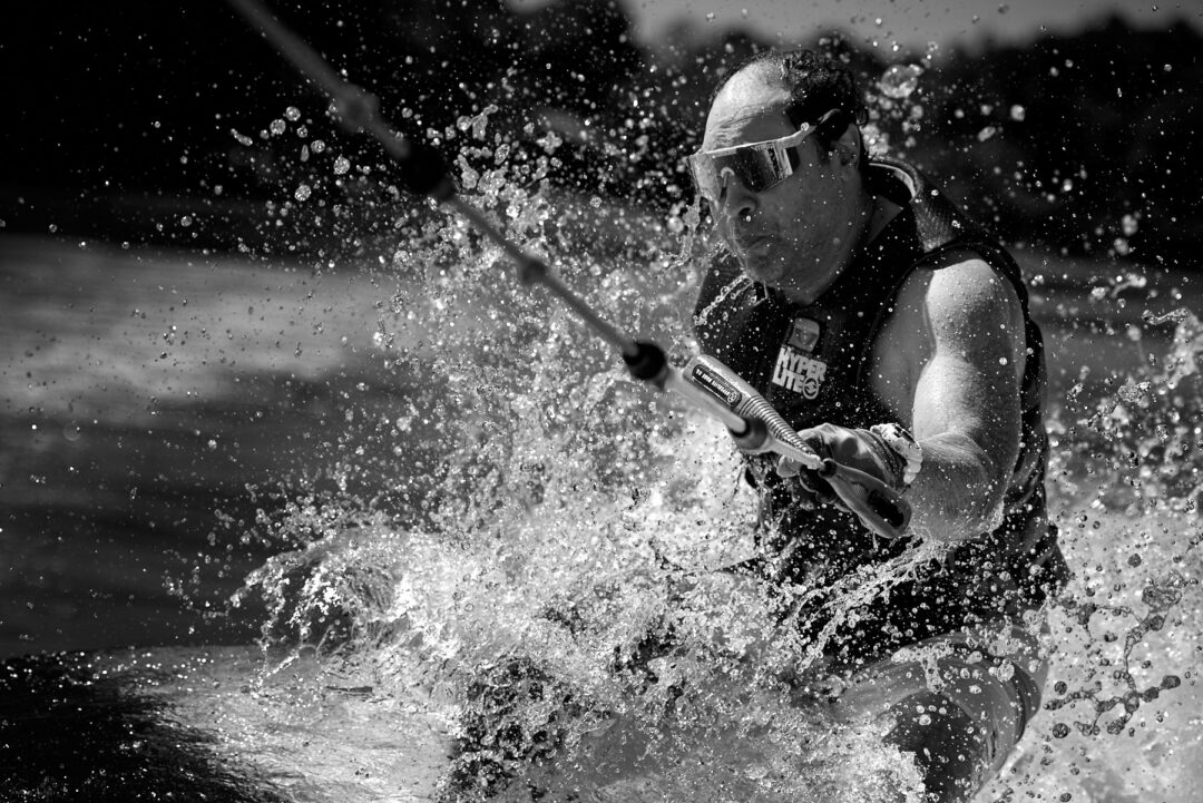 Action and documentary visual production for the Wake for Warriors (W4W) foundation. Capturing wounded veterans and their families experiencing therapeutic water sports, wakeboarding, and wake surfing as pathways to emotional and physical healing. Shot by Luis Cano. High-speed action sports photography of wounded veterans wake surfing at a Wake for Warriors therapeutic event, shot by Luis Cano.