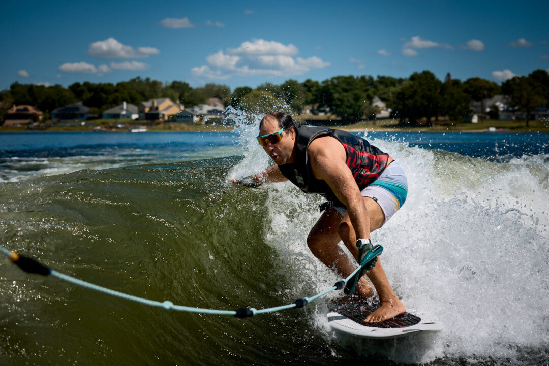 Action and documentary visual production for the Wake for Warriors (W4W) foundation. Capturing wounded veterans and their families experiencing therapeutic water sports, wakeboarding, and wake surfing as pathways to emotional and physical healing. Shot by Luis Cano. High-speed action sports photography of wounded veterans wake surfing at a Wake for Warriors therapeutic event, shot by Luis Cano.