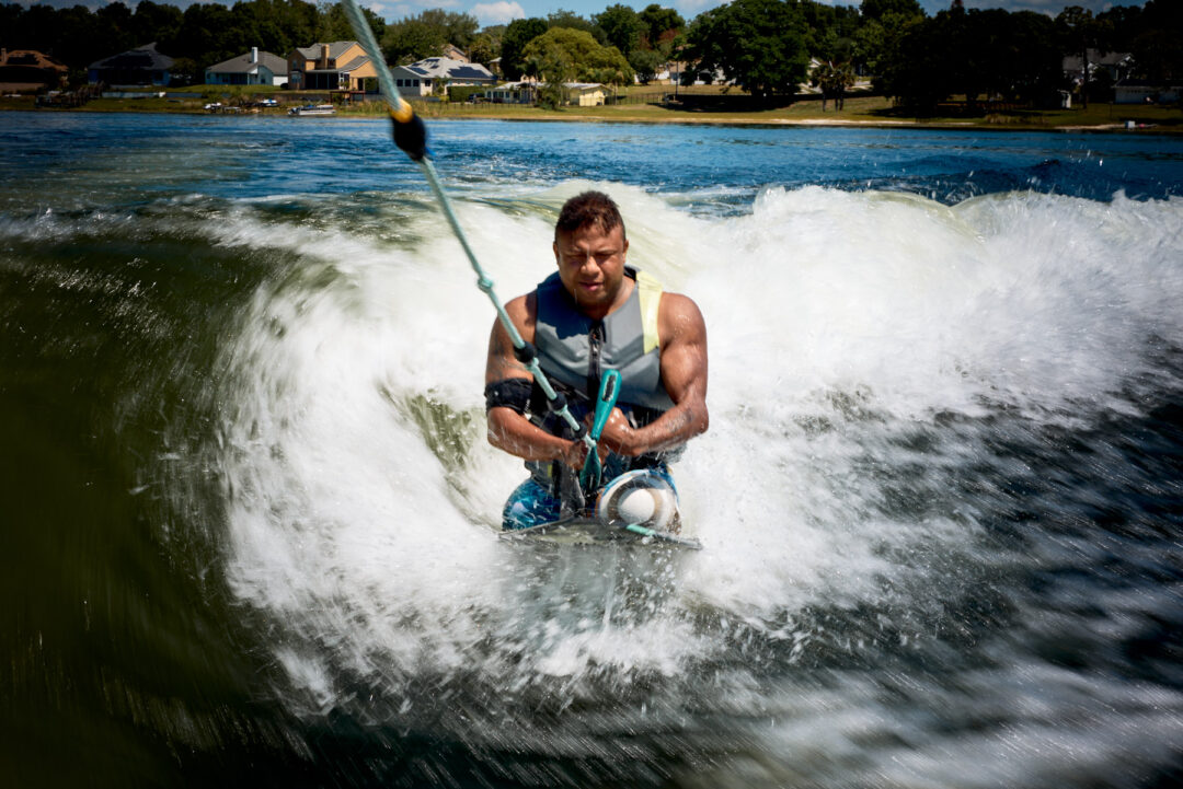 Action and documentary visual production for the Wake for Warriors (W4W) foundation. Capturing wounded veterans and their families experiencing therapeutic water sports, wakeboarding, and wake surfing as pathways to emotional and physical healing. Shot by Luis Cano. High-speed action sports photography of wounded veterans wake surfing at a Wake for Warriors therapeutic event, shot by Luis Cano.