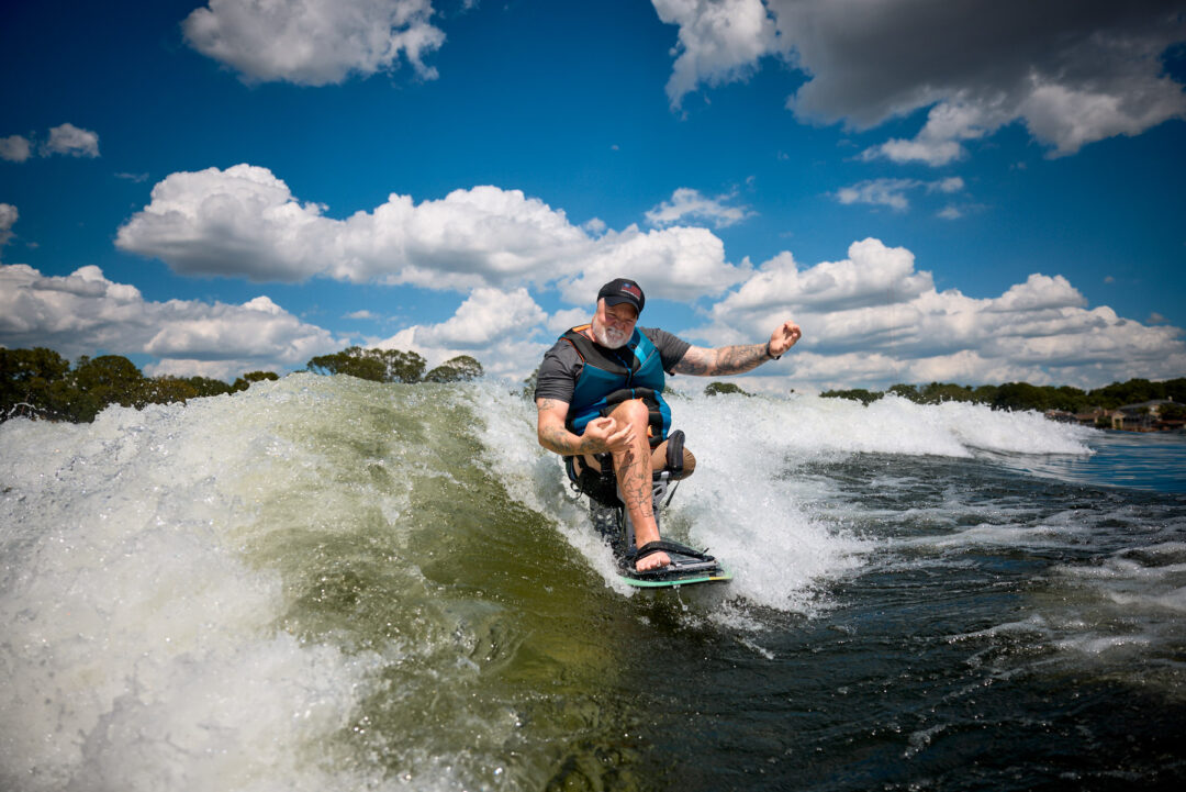 Action and documentary visual production for the Wake for Warriors (W4W) foundation. Capturing wounded veterans and their families experiencing therapeutic water sports, wakeboarding, and wake surfing as pathways to emotional and physical healing. Shot by Luis Cano. High-speed action sports photography of wounded veterans wake surfing at a Wake for Warriors therapeutic event, shot by Luis Cano.
