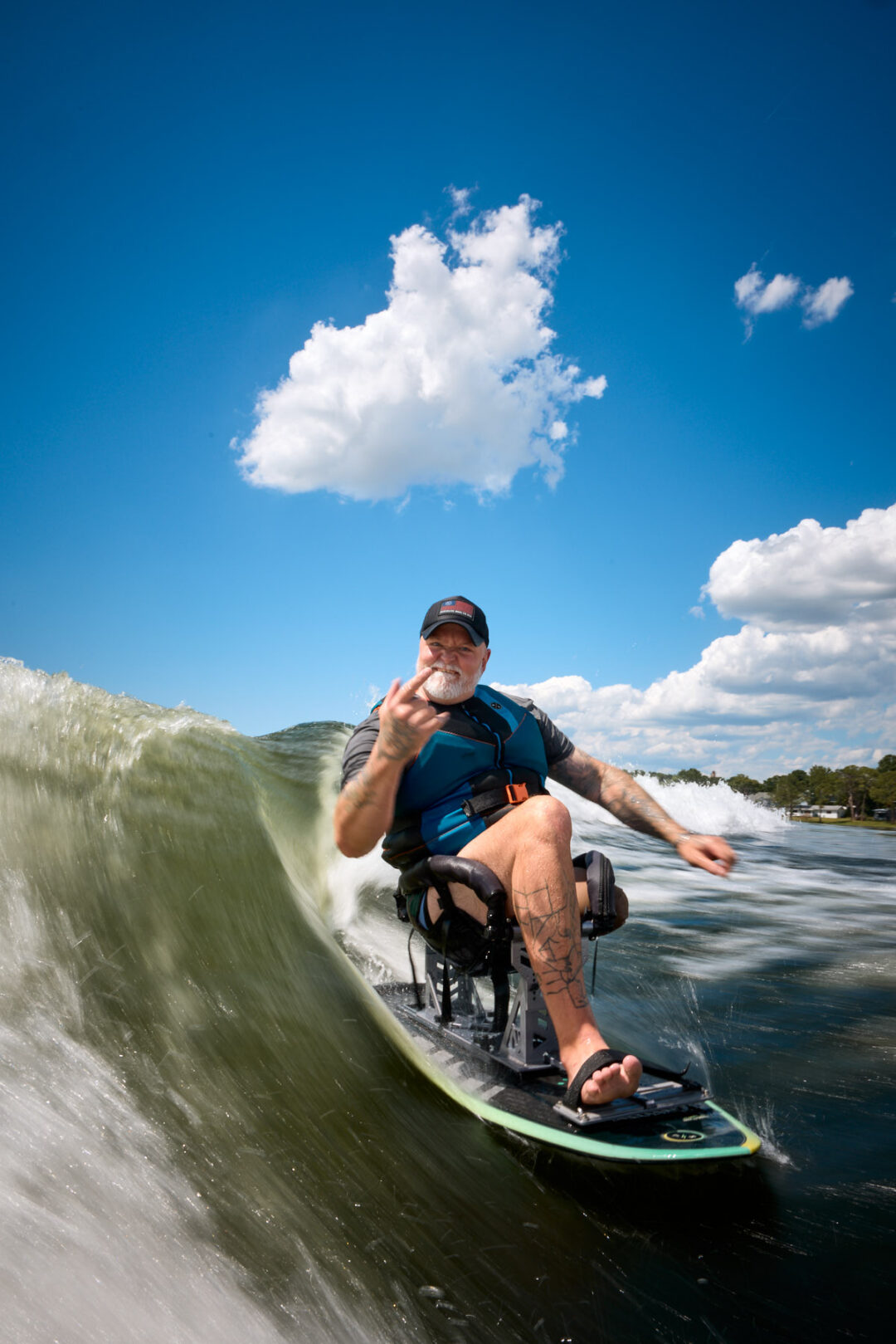 Action and documentary visual production for the Wake for Warriors (W4W) foundation. Capturing wounded veterans and their families experiencing therapeutic water sports, wakeboarding, and wake surfing as pathways to emotional and physical healing. Shot by Luis Cano. High-speed action sports photography of wounded veterans wake surfing at a Wake for Warriors therapeutic event, shot by Luis Cano.