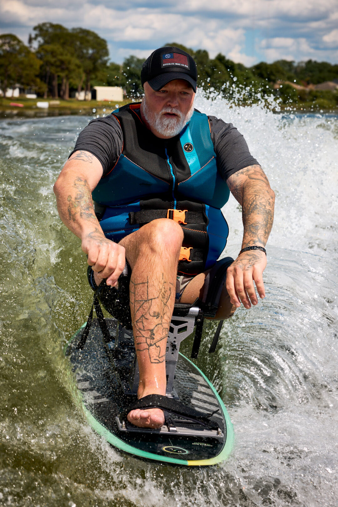 Action and documentary visual production for the Wake for Warriors (W4W) foundation. Capturing wounded veterans and their families experiencing therapeutic water sports, wakeboarding, and wake surfing as pathways to emotional and physical healing. Shot by Luis Cano. High-speed action sports photography of wounded veterans wake surfing at a Wake for Warriors therapeutic event, shot by Luis Cano.