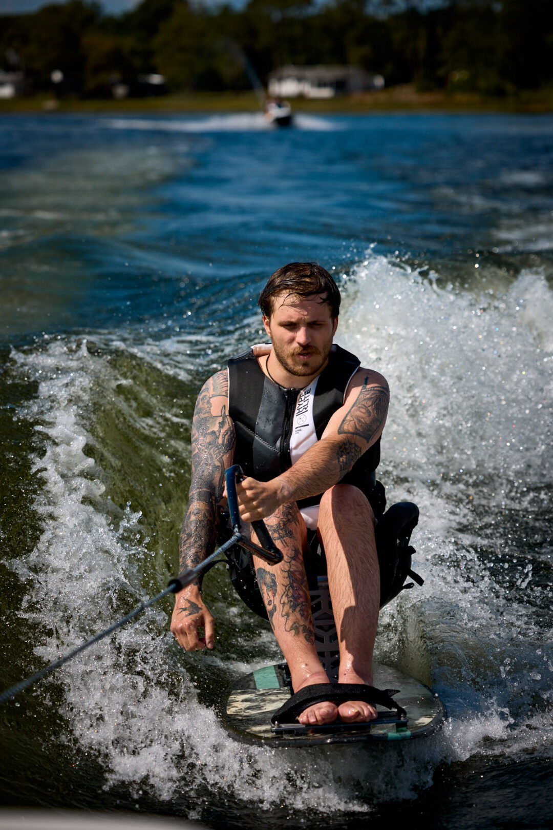 Action and documentary visual production for the Wake for Warriors (W4W) foundation. Capturing wounded veterans and their families experiencing therapeutic water sports, wakeboarding, and wake surfing as pathways to emotional and physical healing. Shot by Luis Cano. High-speed action sports photography of wounded veterans wake surfing at a Wake for Warriors therapeutic event, shot by Luis Cano.