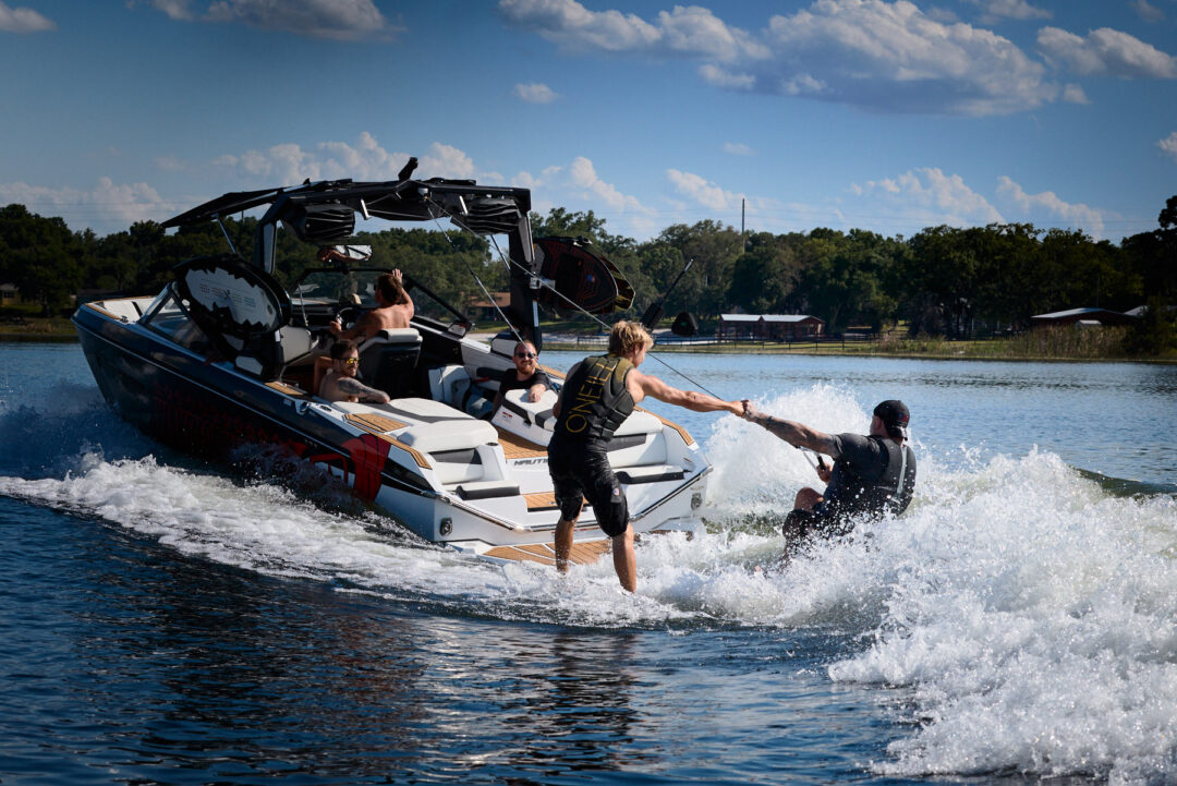 Action and documentary visual production for the Wake for Warriors (W4W) foundation. Capturing wounded veterans and their families experiencing therapeutic water sports, wakeboarding, and wake surfing as pathways to emotional and physical healing. Shot by Luis Cano. High-speed action sports photography of wounded veterans wake surfing at a Wake for Warriors therapeutic event, shot by Luis Cano.