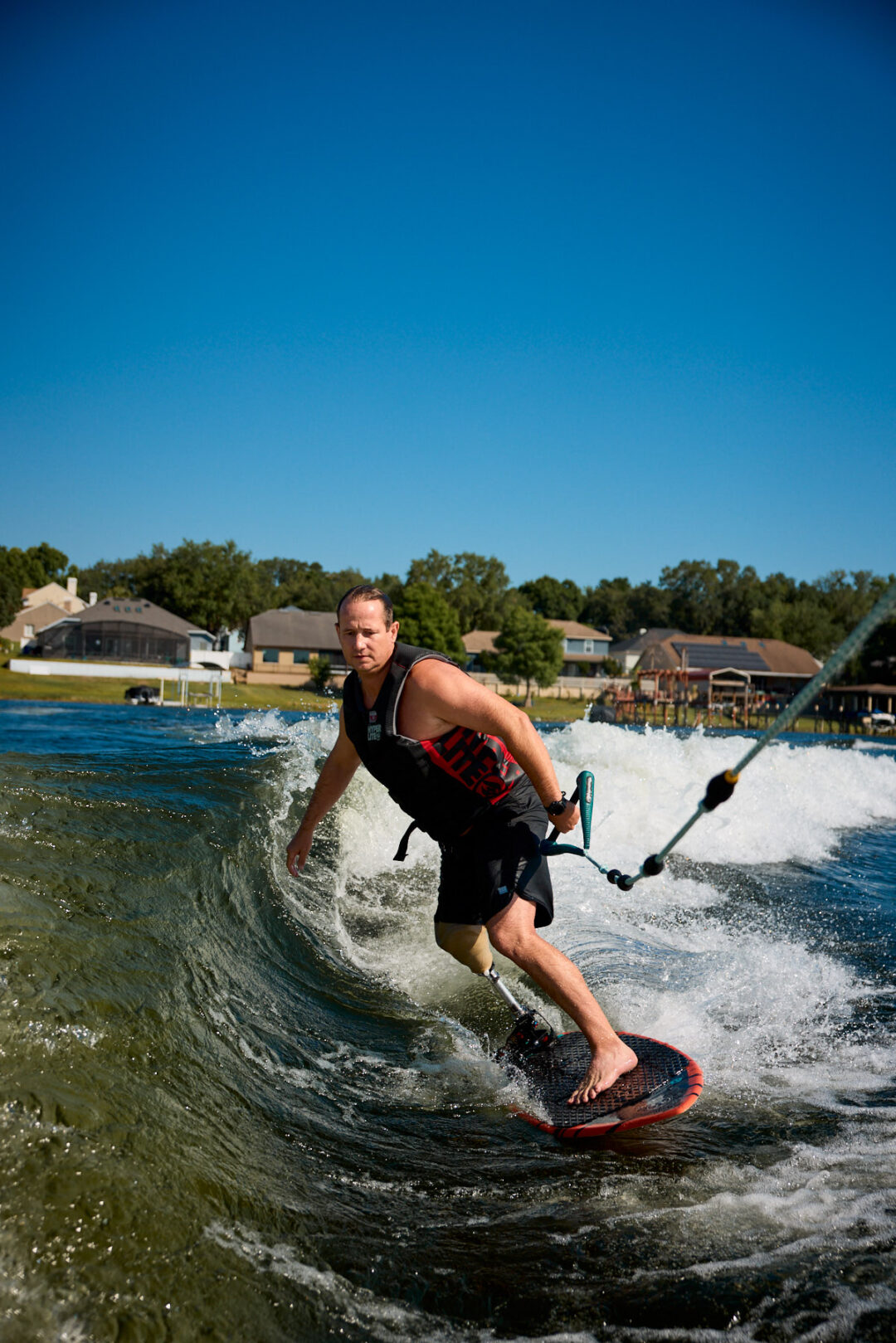 Action and documentary visual production for the Wake for Warriors (W4W) foundation. Capturing wounded veterans and their families experiencing therapeutic water sports, wakeboarding, and wake surfing as pathways to emotional and physical healing. Shot by Luis Cano. High-speed action sports photography of wounded veterans wake surfing at a Wake for Warriors therapeutic event, shot by Luis Cano.
