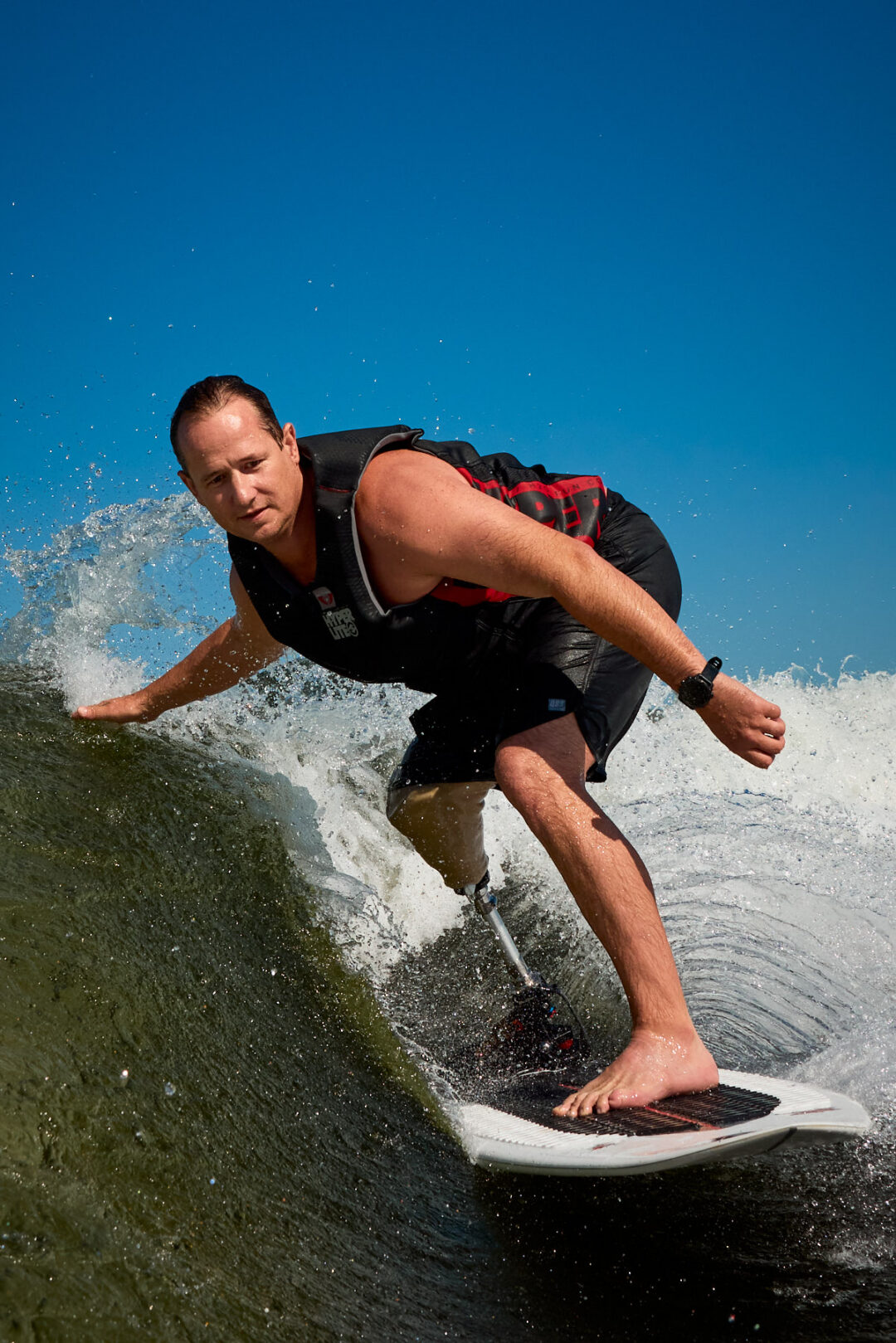 Action and documentary visual production for the Wake for Warriors (W4W) foundation. Capturing wounded veterans and their families experiencing therapeutic water sports, wakeboarding, and wake surfing as pathways to emotional and physical healing. Shot by Luis Cano. High-speed action sports photography of wounded veterans wake surfing at a Wake for Warriors therapeutic event, shot by Luis Cano.