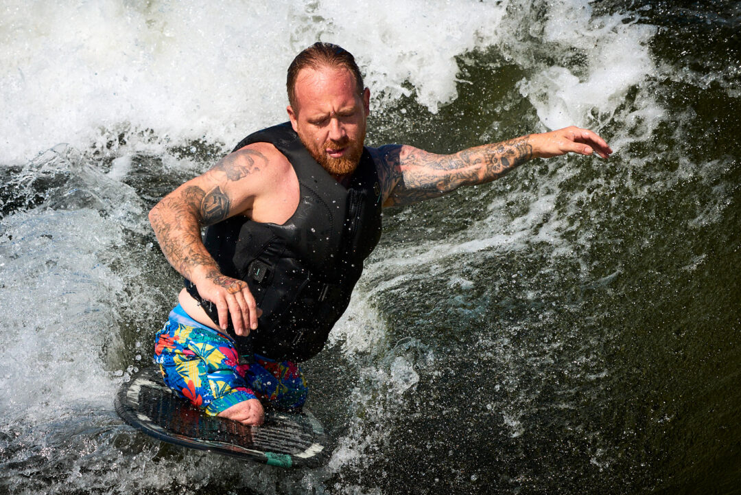 Action and documentary visual production for the Wake for Warriors (W4W) foundation. Capturing wounded veterans and their families experiencing therapeutic water sports, wakeboarding, and wake surfing as pathways to emotional and physical healing. Shot by Luis Cano. High-speed action sports photography of wounded veterans wake surfing at a Wake for Warriors therapeutic event, shot by Luis Cano.