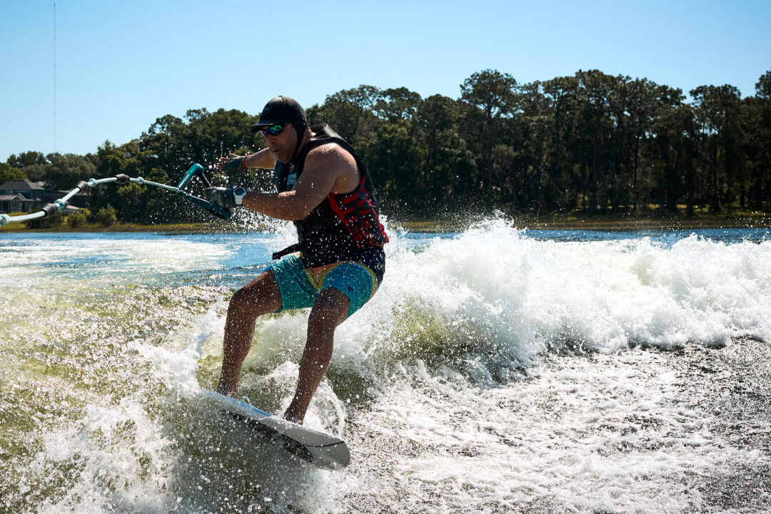 Action and documentary visual production for the Wake for Warriors (W4W) foundation. Capturing wounded veterans and their families experiencing therapeutic water sports, wakeboarding, and wake surfing as pathways to emotional and physical healing. Shot by Luis Cano. High-speed action sports photography of wounded veterans wake surfing at a Wake for Warriors therapeutic event, shot by Luis Cano.