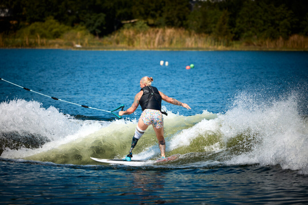 Action and documentary visual production for the Wake for Warriors (W4W) foundation. Capturing wounded veterans and their families experiencing therapeutic water sports, wakeboarding, and wake surfing as pathways to emotional and physical healing. Shot by Luis Cano. High-speed action sports photography of wounded veterans wake surfing at a Wake for Warriors therapeutic event, shot by Luis Cano.
