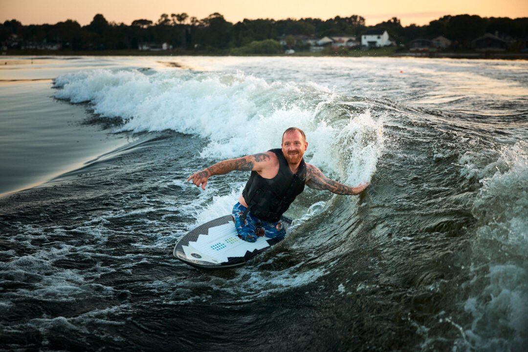 Action and documentary visual production for the Wake for Warriors (W4W) foundation. Capturing wounded veterans and their families experiencing therapeutic water sports, wakeboarding, and wake surfing as pathways to emotional and physical healing. Shot by Luis Cano. High-speed action sports photography of wounded veterans wake surfing at a Wake for Warriors therapeutic event, shot by Luis Cano.