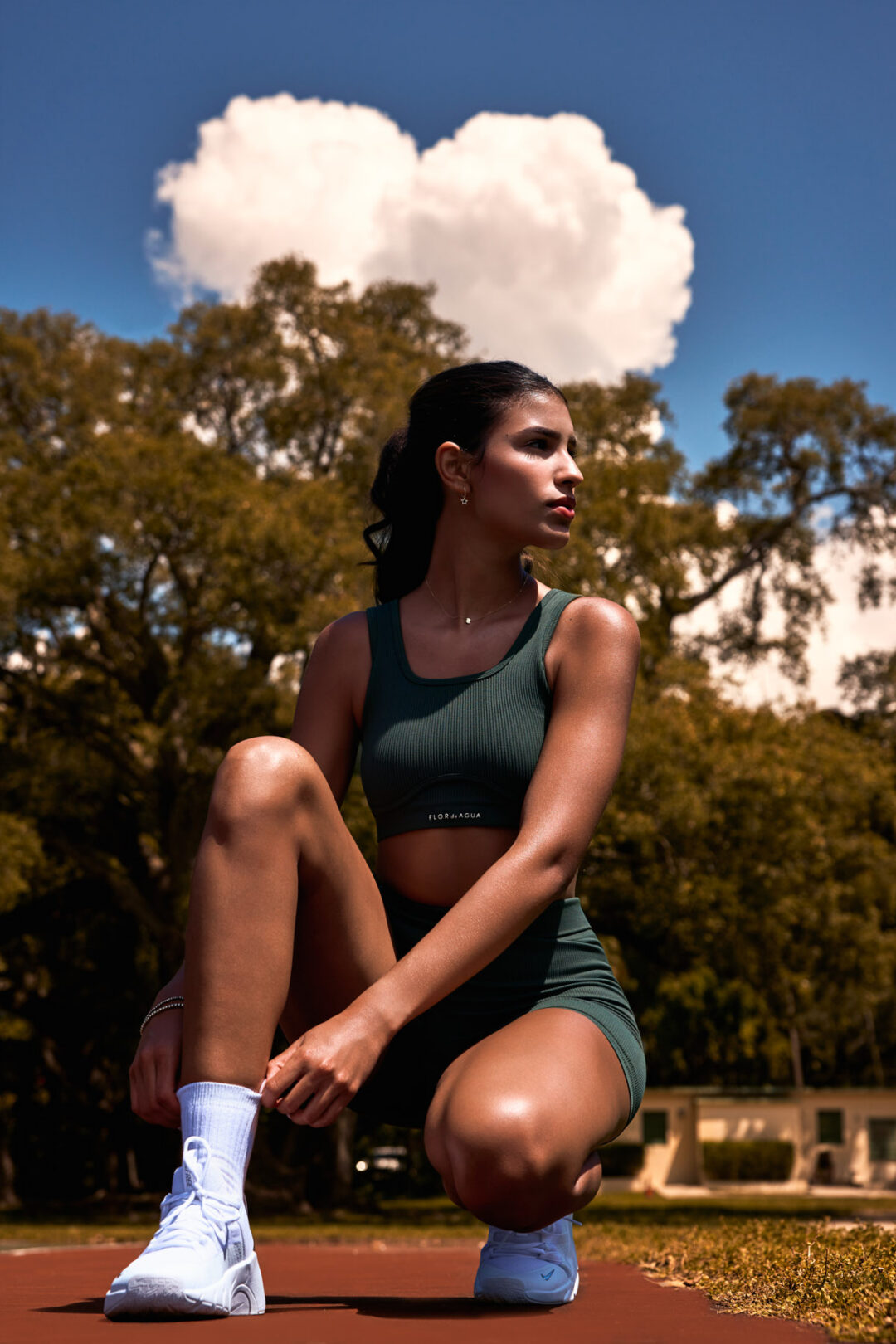 Commercial fashion and fitness visual campaign titled The Divine Dualism. High-end editorial production exploring feminine duality through high-contrast storytelling: combining styled luxury glamour with raw, athletic movement. Shot on location in Miami using hybrid natural light and flash techniques, directed by Luis Cano.